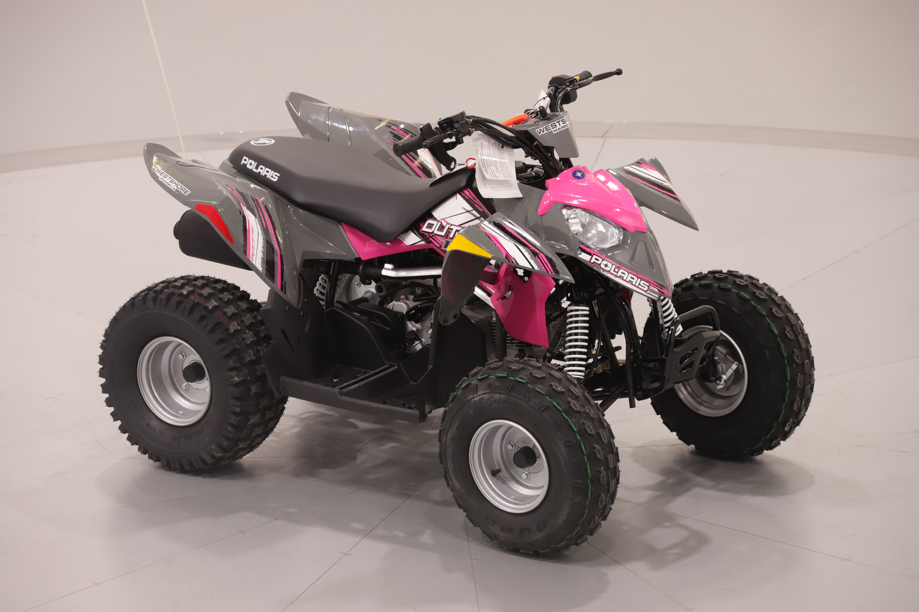Pre-Owned 2022 Polaris OUTLAW 110 EFI - AVALANCHE GRAY/PINK POWER
